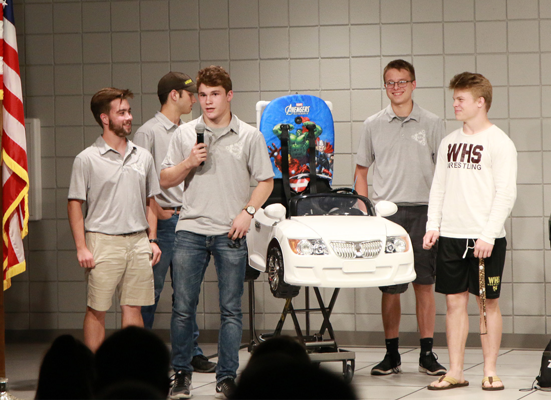 WVU Parkersburg and Wood County Technical Center students gift Go Baby Go therapy cars to local children