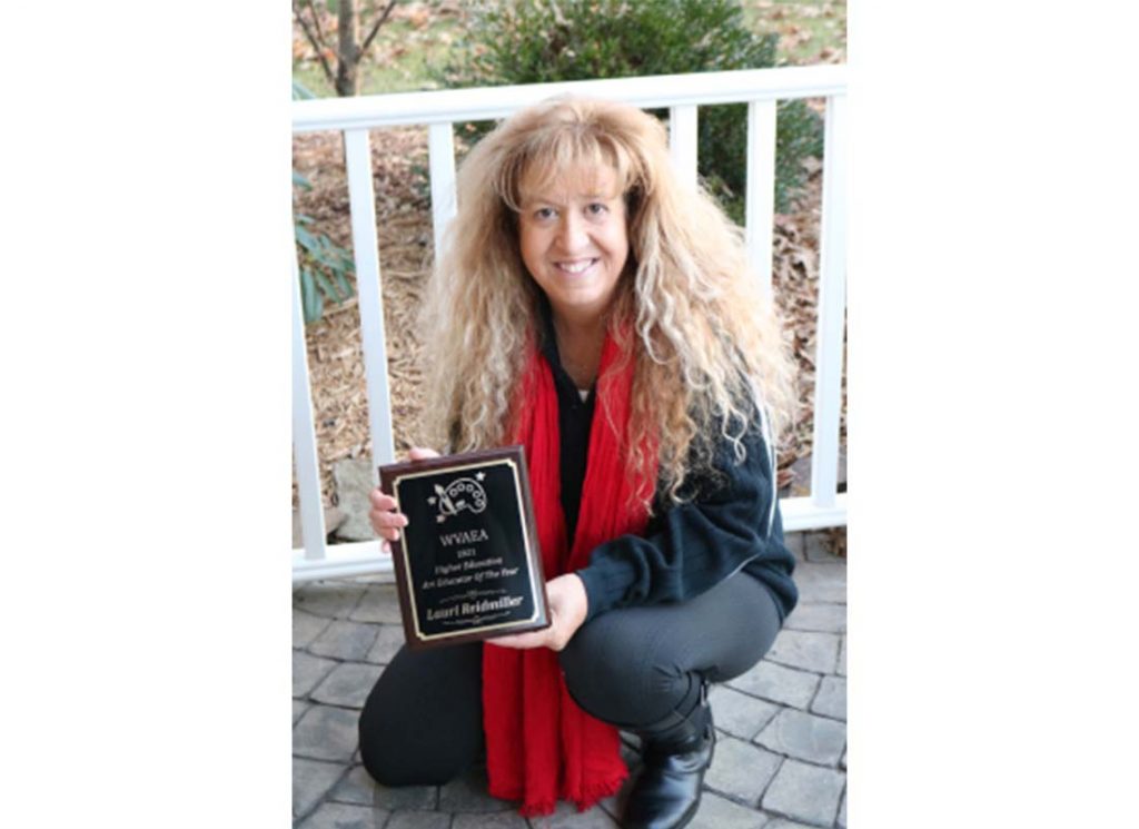 WVU Parkersburg Dr. Lauri Reidmiller receives the West Virginia Higher Art Educator of the Year Award.